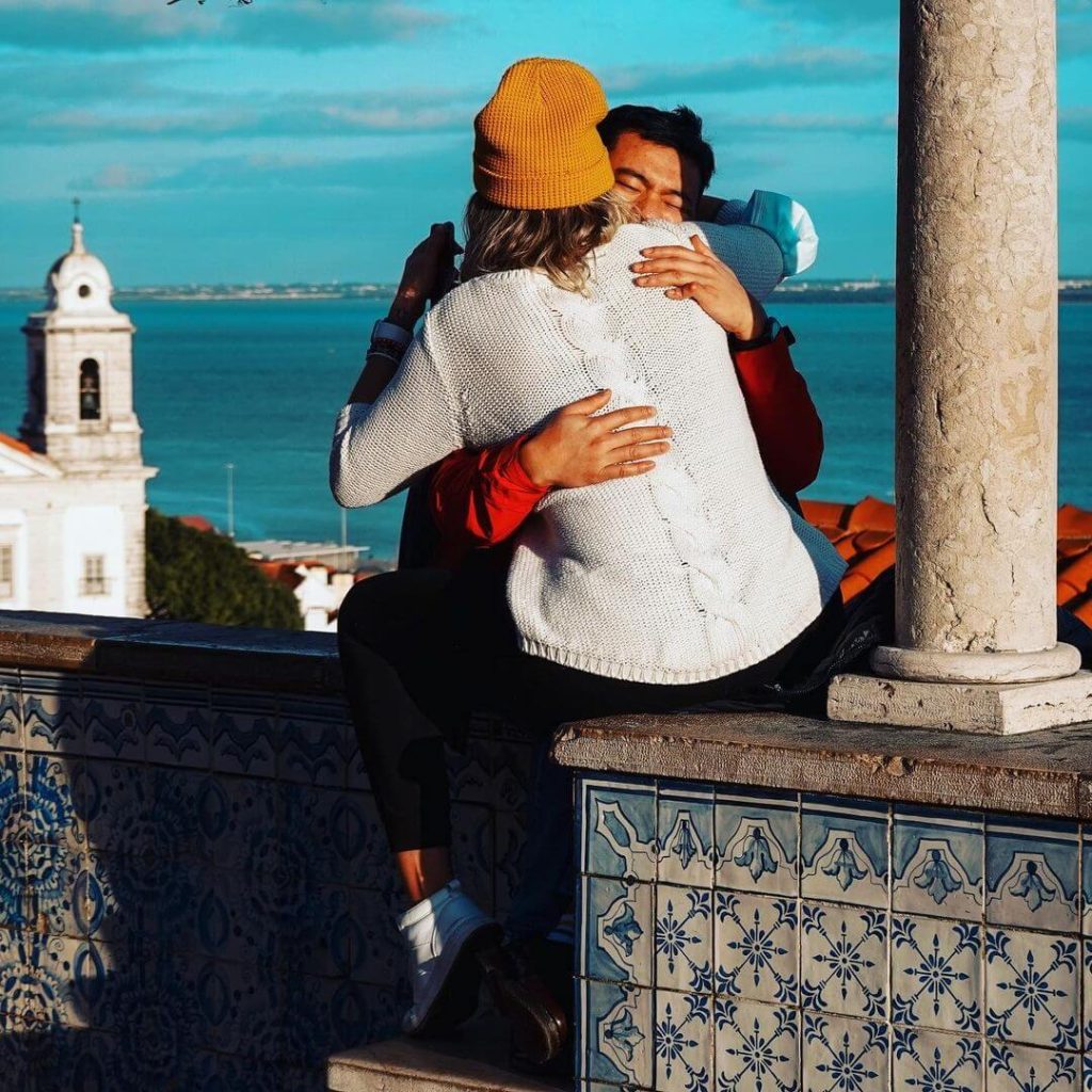 Sunset Embrace: Love Above Lisbon